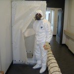 PPE with RPE in use on a mould remediation job.